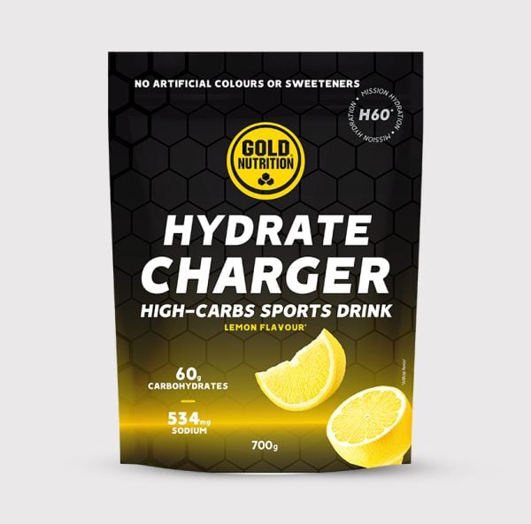 GoldNutrition Hydrate Charger H60 electrolyte drink powder in a resealable pouch, with colorful packaging and measuring scoop visible.