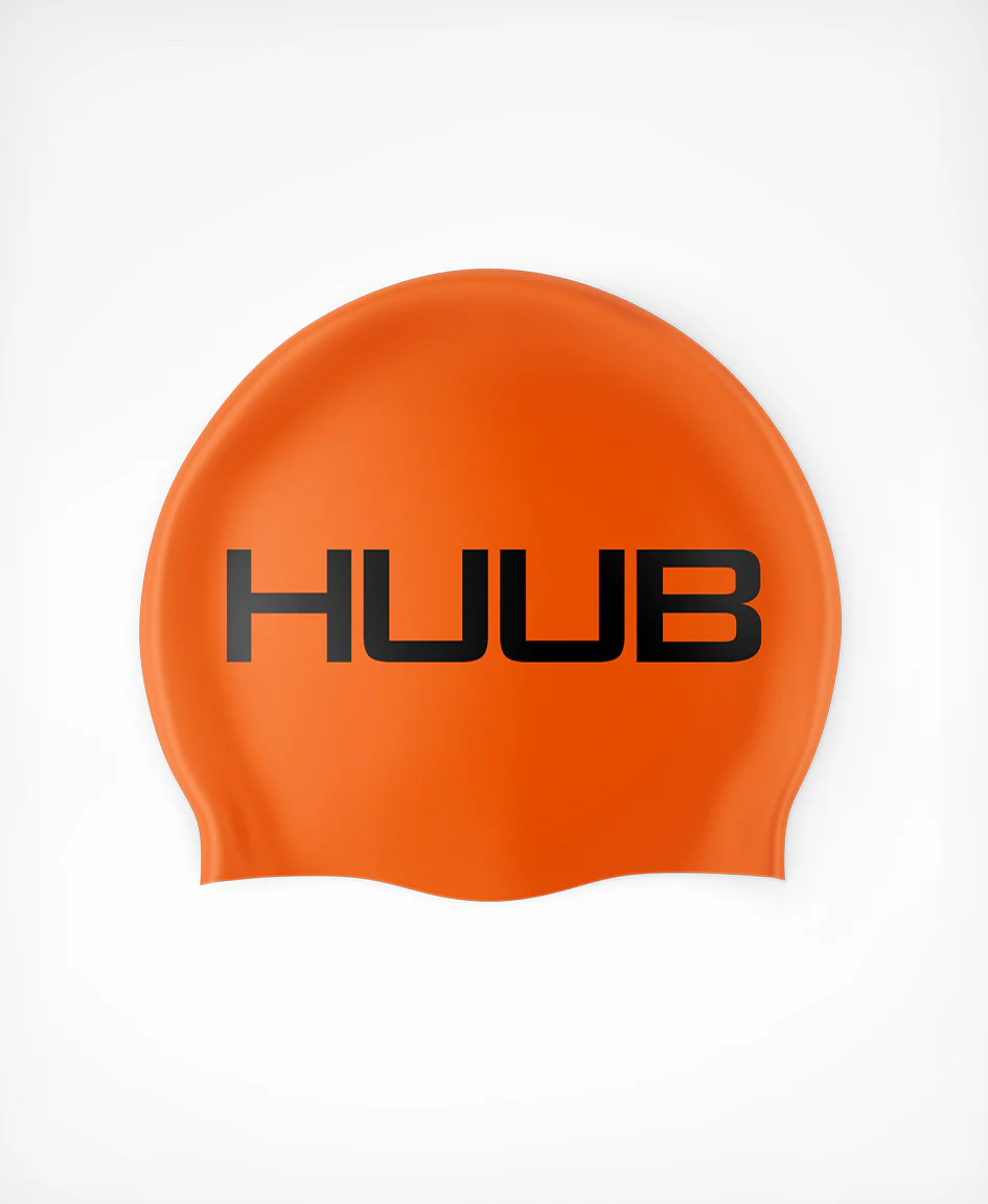 Bright orange HUUB silicone swim cap with a snug fit, designed for comfortable and streamlined swimming.