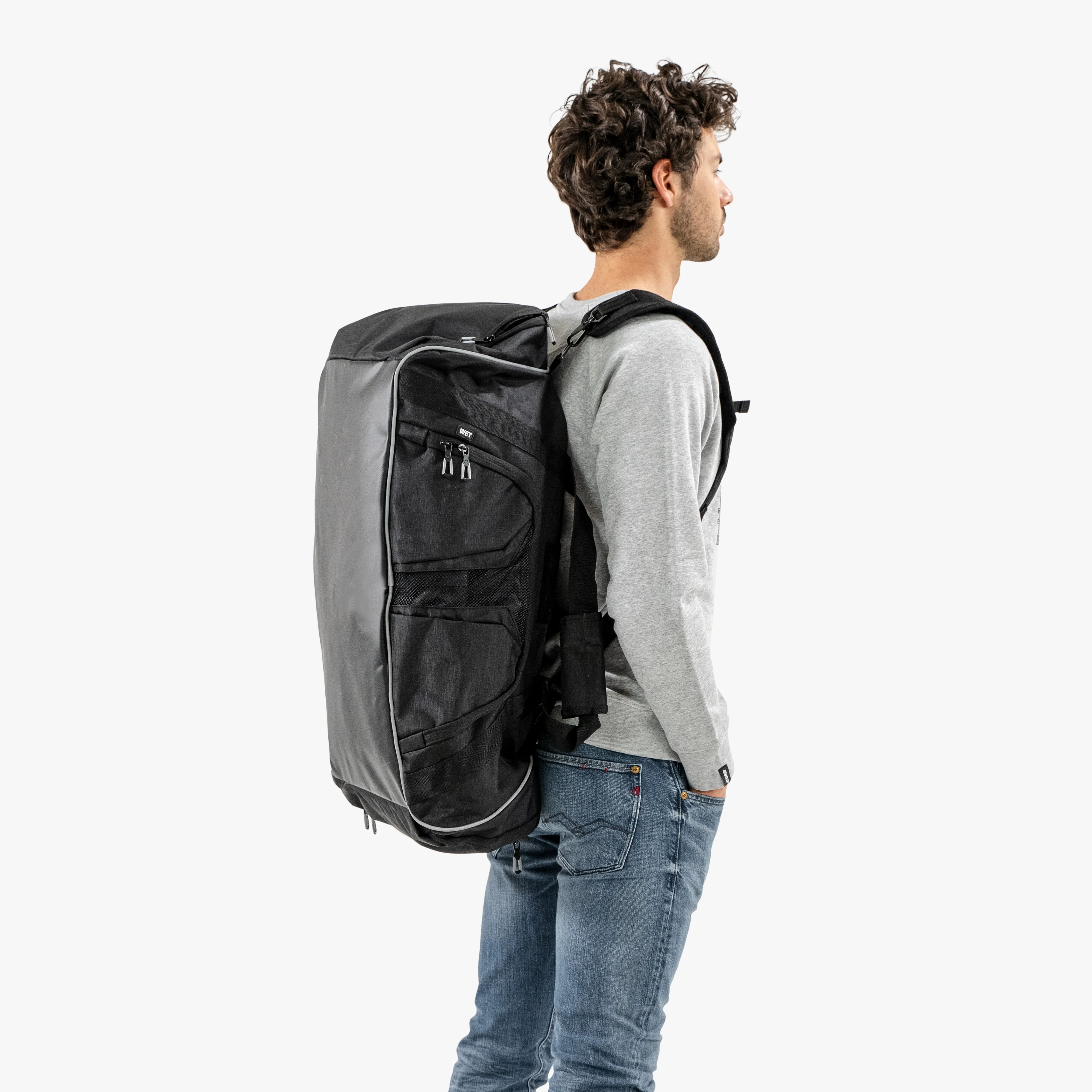 Scicon 50L duffel bag with black nylon fabric, sturdy handles, and a spacious main compartment for travel or sports gear.