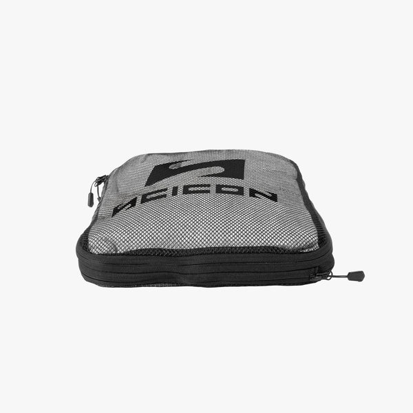 Scicon compression packing cube set with multiple organized, space-saving travel cubes for efficient packing and luggage organization.