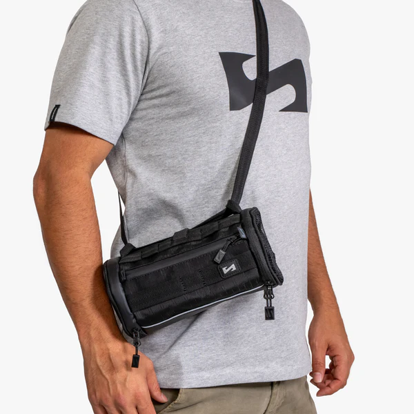 Scicon cycling handlebar bag attached to a bike, compact storage solution for cycling gear and essentials.