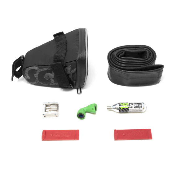 Large Scicon saddle bag for MTB cycling, shown attached to mountain bike, with secure straps and durable material for outdoor rides.