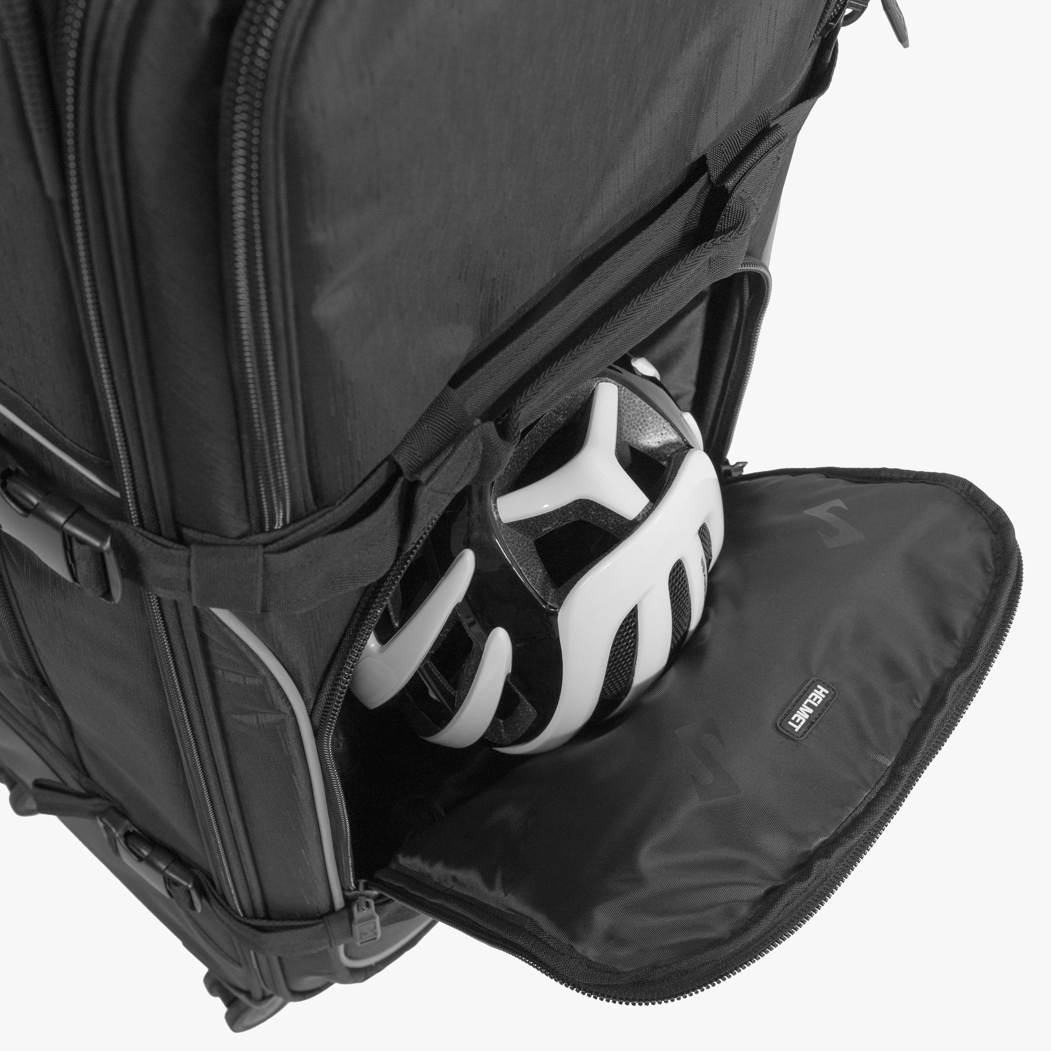 Scicon 110L 4WD Trolley Luggage with sturdy wheels and telescopic handle, durable black hard-shell exterior for travel.