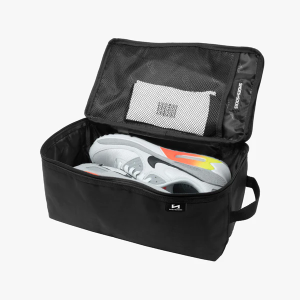 Scicon sneaker travel bag with padded compartments for shoes, lightweight and durable for easy packing and travel.